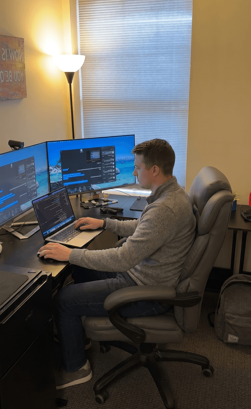 Private office with dual monitors and flexible workspace setup