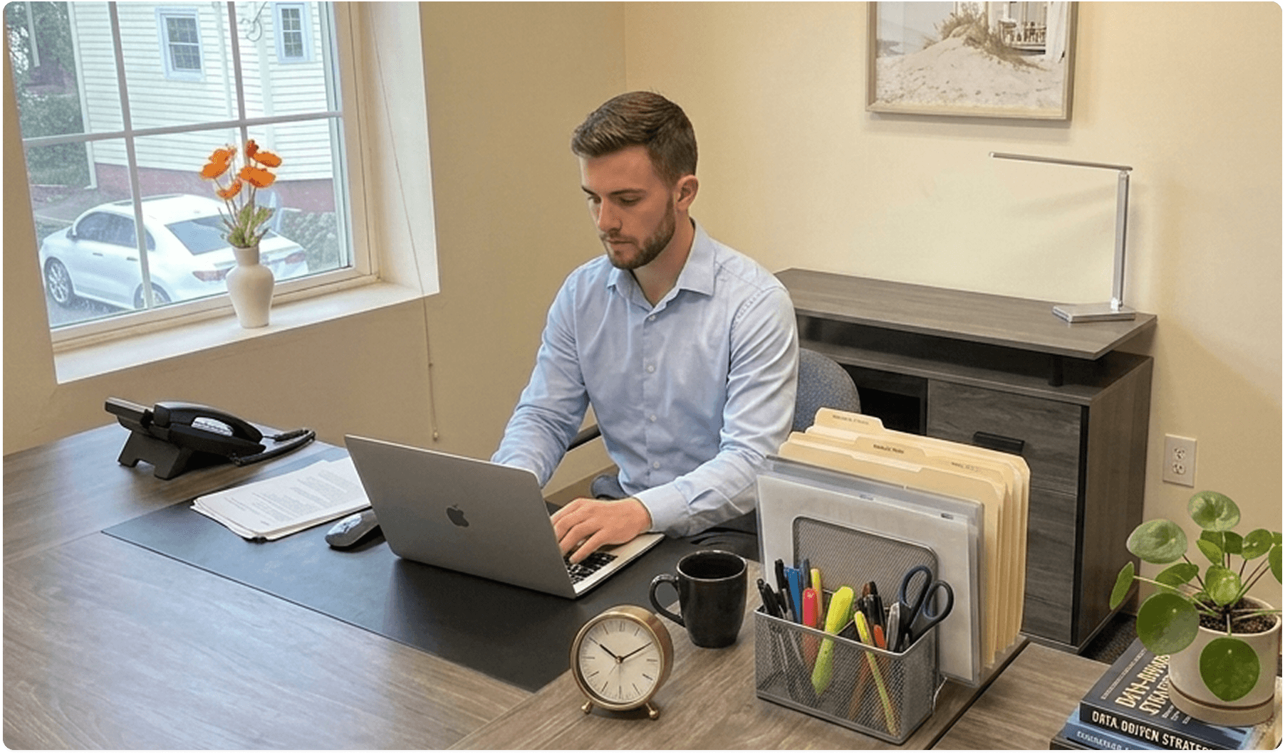 Dedicated desk with laptop and office essentials